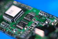 Electronics: The picture shows a printed circuit board as a synonym for the manifold application possibilities of surface analytical methods in the electronics and semiconductor industry.